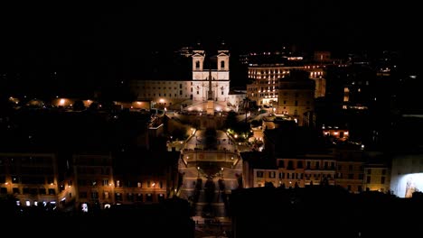 Cinematic-Establishing-Drone-Shot-Above-Spanish-Steps-in-Rome,-Italy-at-Night