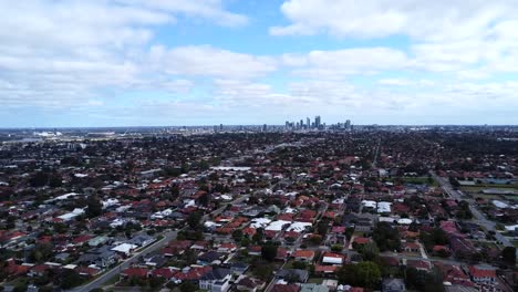 Aerial-view---Perth-suburban-real-estate-housing-to-CBD-on-horizon