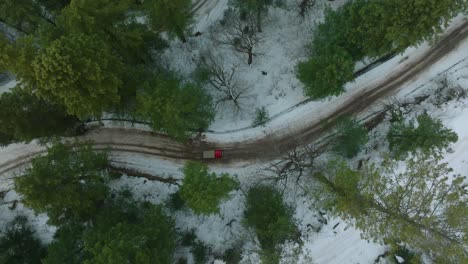 Top-view-of-a-tourist-car-standing-still-on-a-pathway-of-Shogran-Valley-in-Pakistan