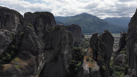 Orbit-Aerial-view-rock-formation-Meteora-region-Greece-cloudy-Day