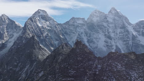 Drone-captures-breathtaking-aerial-landscape-of-Everest-Base-Camp-Nepal-and-surrounding-massive-mountains,-showcasing-one-of-Nepal's-most-thrilling-and-stunning-views