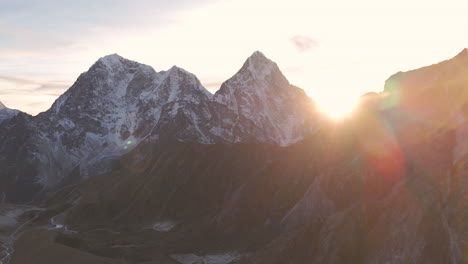 Aerial-drone-view-of-Everest-Base-Camp-trek-from-Lobuche,-Nepal,-during-sunset-golden-hour