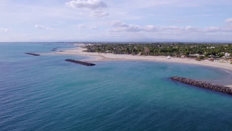 Aerial-establishing-shot-of-rock-formations-used-to-break-the-waves-in-Sete