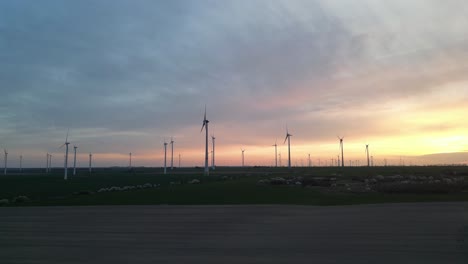 Wind-mills-turbine-farm-production-of-renewable-green-energy-power