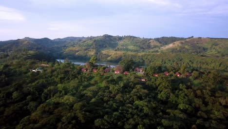 Aerial-View-Of-Ndali-Lodge-Near-Fort-Portal-Overlooking-Lake-Nyiambuga-In-Western-Uganda