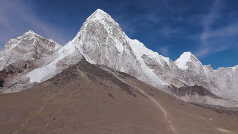 Drone-captures-landscape-of-Kala-Patthar-viewpoint-and-Pumori-Mountain-at-Everest-Base-Camp,-Nepal