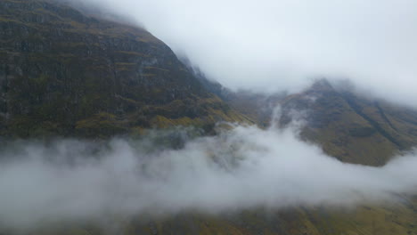 Scottish-Glencoe-Highlands-Mountain-Valley-in-the-Clouds-AERIAL