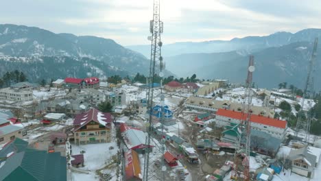 Pan-shot-of-a-town-situated-on-mountains-of-Shoran-Valley-in-Pakistan-on-a-early-morning