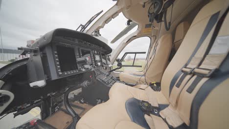 Experience-the-immersive-first-person-view-from-inside-the-cockpit-of-the-Bell-249-helicopter,-witnessing-the-pilot's-perspective-and-flight-controls