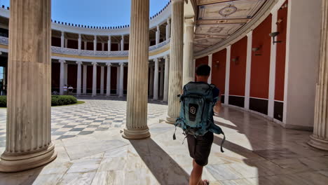 A-tourist-visiting-the-zappeion-conference-center-in-Athens,-Greece