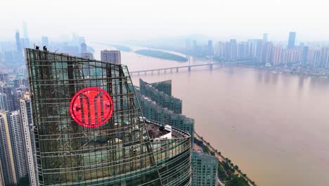 Aerial-view-of-Changsha-cityscape-in-Hunan-Province-with-a-misty-and-foggy-sky