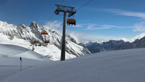 Cable-cars-transporting-occupants-up-and-down-picturesque-mountain-slopes