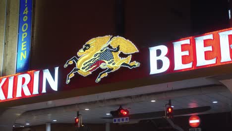 Slow-motion-pan-over-night-scene-in-Hiroshima-City,-Neon-Signage-in-the-night