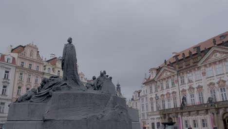 Overcast-sky-over-Prague-showcasing-historical-architecture-and-a-prominent-statue,-early-morning