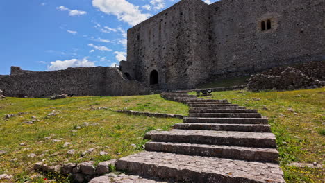 Steps-leading-to-medieval-castle,-outside-walls-of-Chlemoutsi,-Greece