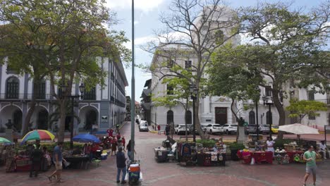 A-bustling-day-at-Independence-Square-in-Casco-Viejo,-Panama-City-with-vibrant-market-stalls