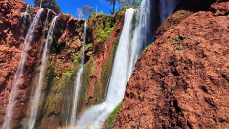 Waterfall-in-North-Africa-Ouzoud-Falls-Morocco,-rainbow-over-water-falling