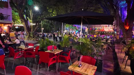 Nightlife-in-tourist-district-Provenza-in-El-Poblado,-Medellin,-Colombia,-crowded-bars-and-restaurants