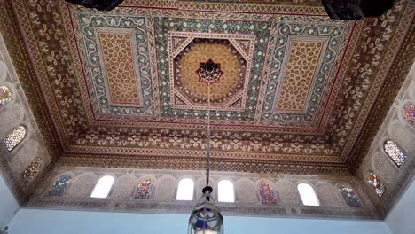 Riad-room-in-Marrakech-Morocco-with-decorated-islamic-art-ceiling