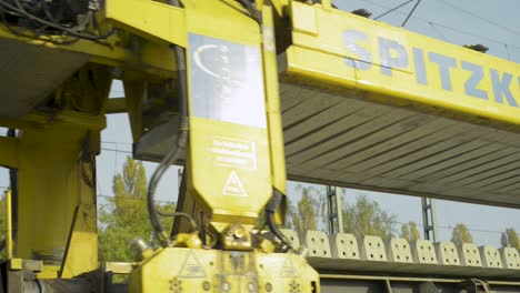 Close-up-view-of-the-yellow-Spitzke-crane-machinery-during-the-day