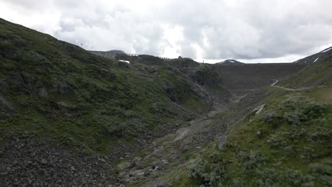 Drone-View-of-Valley-Besides-a-Dam