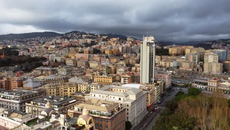 Residential-and-office-buildings-in-Genoa-city-center,-dark-clouds