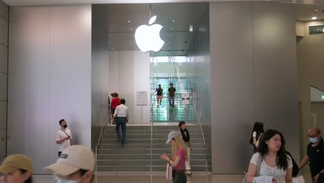 Customers-arrive-at-the-official-store-of-the-American-multinational-technology-company,-Apple,-in-Hong-Kong