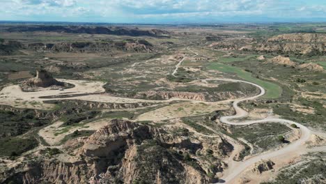 Scenic-Road-in-Monegros-Semi-Desert,-Aragon,-North-Spain---Aerial-4k