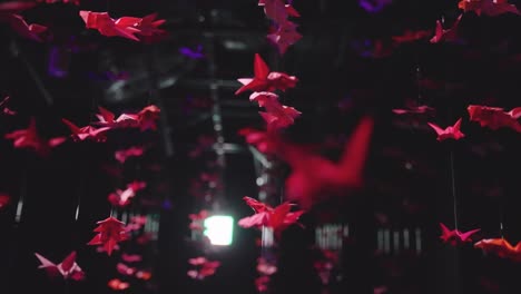 Origami-Background-Hanging-at-Ginza-Aquarium,-Tokyo-Japan