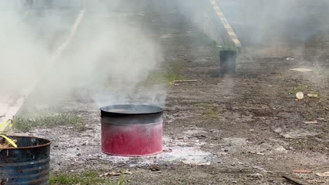 Spraying-extinguisher-to-put-out-fire,-static-view