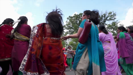 Low-angle-shot-of-Hindu-women-dancing