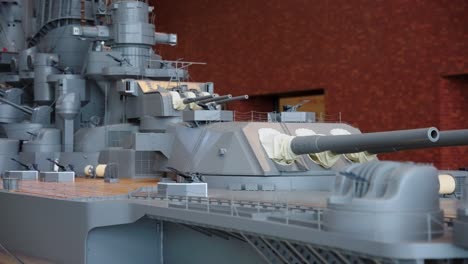 Slow-pan-revealing-the-hundreds-of-guns-that-were-mounted-to-the-Yamato,-largest-battleship-ever-constructed