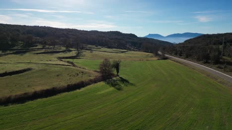 Rolling-green-fields-and-winding-roads-stretch-through-the-scenic-Tavertet-region-near-Barcelona