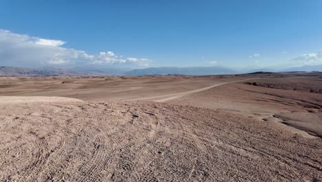 Empty-Agafay-desert,-sand-dunes,-clear-blue-sky-outside-Marrakesh-Morocco