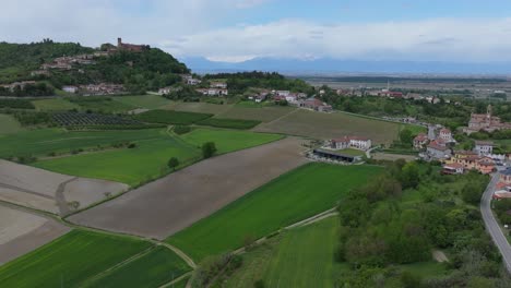 lush-green-countryside-farming-fields-outside-of-Camino,-the-site-of-the-Castello-di-Camino-and-storied-history-of-visiting-dignitaries-in-Italy