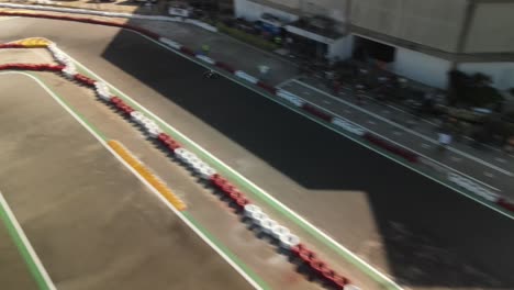 Aerial-of-go-karts-overtaking-racer-on-a-track-at-the-national-championship-on-Isla-de-Margarita