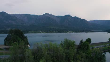 Drone-soars-above-Columbia-River-crossing-over-cove-and-highway-to-establish-homes-on-opposite-shore