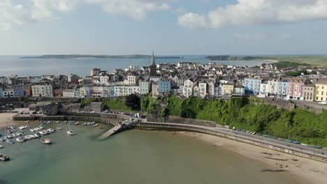 An-aerial-view-of-the-of-the-Welsh-harbour-town-of-Tenby-in-Pembrokeshire,-South-Wales,-on-a-sunny-summer-morning