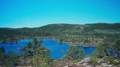 Small-Islands-And-Dense-Forest-Mountains-Over-Hiking-Trails