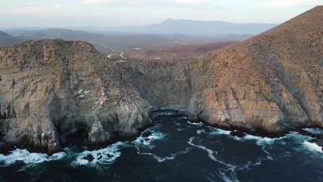 Pacific-ocean-shoreline-in-Baja-California-Sur,-Mexico,-Aerial-view-Punta-Lobos