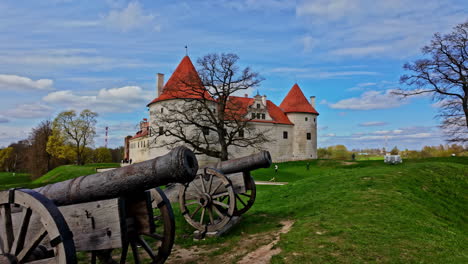 Bauska-Medieval-Castle-in-Latvia,-Europe-palace-with-orange-tile-roof