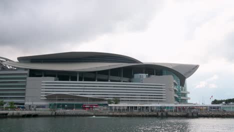 With-a-backdrop-of-Victoria-Harbour-and-Hong-Kong's-skyline,-the-Hong-Kong-Convention-and-Exhibition-Centre-anchors-city-events