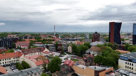 Aerial-of-Klaipeda-city-skyline-apartment-buildings-under-the-rainy-sky