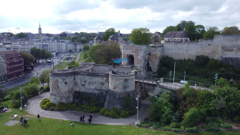 Aerial-Orbit-Caen-Castle-with-People-in-the-Park-on-a-Sunny-Day