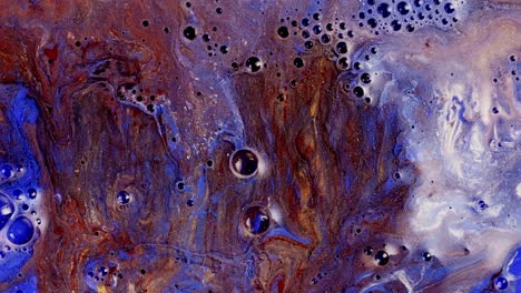 Abstract-fluid-art-with-vibrant-swirls-and-bubbles-in-purple,-blue,-and-red-tones