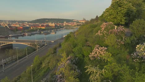 A-Glimpse-of-the-Vltava-River-and-the-City-of-Prague-in-the-Czech-Republic---Drone-Flying-Forward