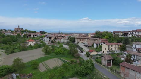 slow-aerial-close-up-of-the-charming-town-of-Camino,-Piedmont,-Italy