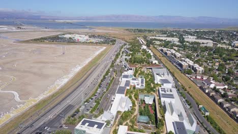 Aerial-drone-of-facebook-headquarters-building-in-Silicon-Valley,-Menlo-Park,-CA