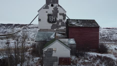 Sharples,-Alberta---February-4,-2023---The-Abandoned-P-H-company-grain-elevator-in-the-ghost-town-of-Sharples-Alberta-at-sunrise