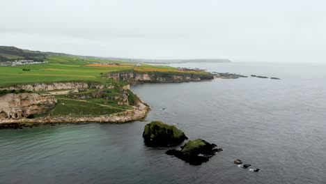 Aerial-footage-of-the-Northern-Irish-coast-by-the-Carrick-a-rede-rope-bridge